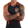 A person wearing a black sleeveless shirt with an orange tiger graphic and trim, showing muscular arms.
