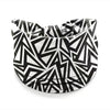 A black and white geometric patterned stretch cotton headband folded in a circular shape.