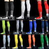A collection of long football training socks for men in various colors and patterns.