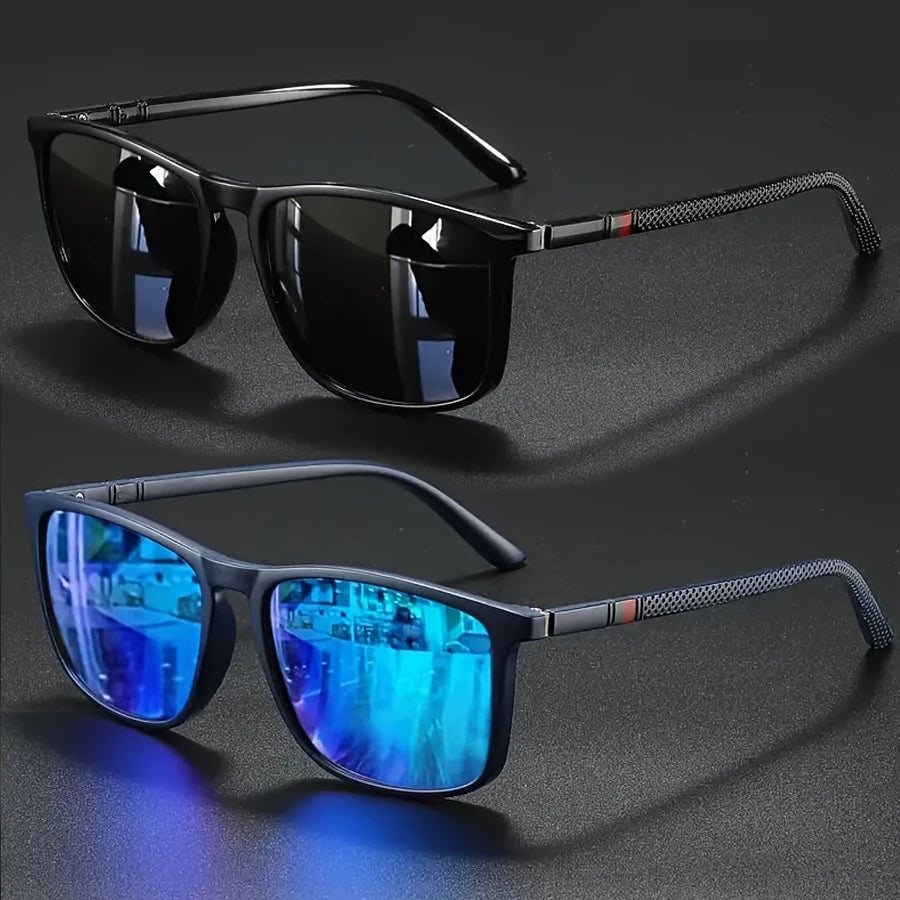A pair of black vintage square sunglasses with blue mirrored lenses resting on a dark surface.