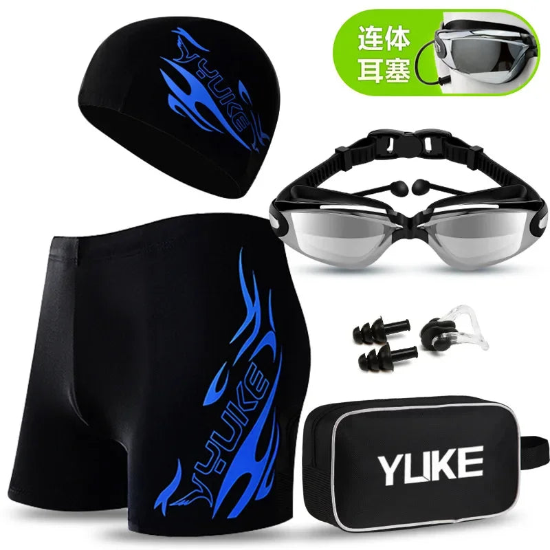 Black men's swim suit set including a cap, goggles, and ear plugs