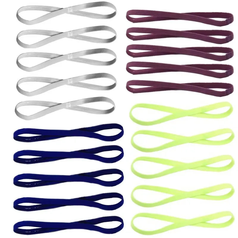 A pack of five elastic silicone sports headbands in various shades of purple and green.