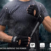 A person wearing a dark t-shirt and black pressurized bracers demonstrates the power of fitness only hand gloves.