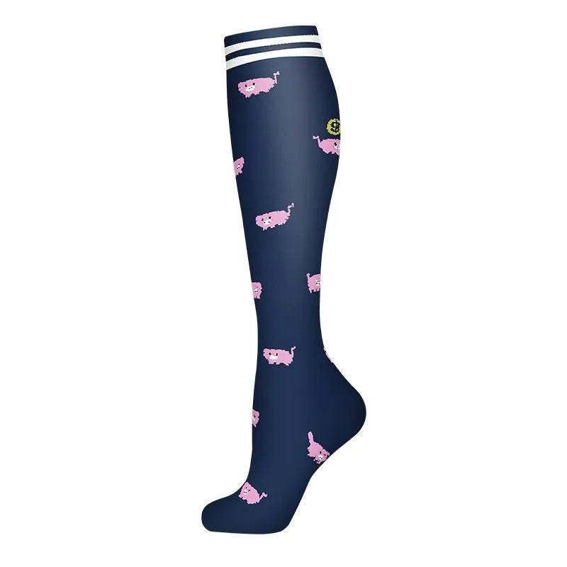 Navy compression socks with pink pig designs and white stripes