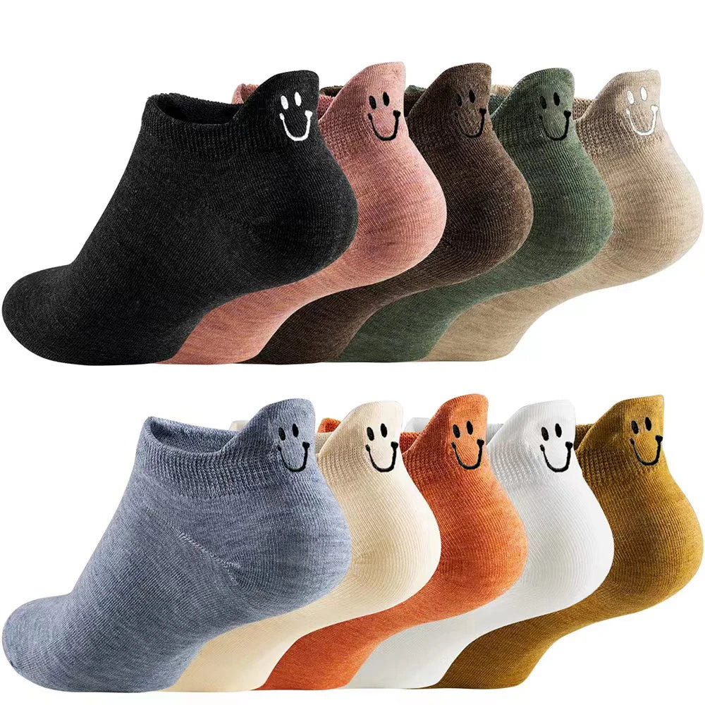 A pack of ten embroidered ankle socks in various pastel and earthy tones displayed side by side.