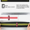Black elastic knee wraps with yellow stripes shown next to a ruler and a hand.