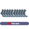 A pack of ten pairs of grey men's sport compression socks laid out in a row.