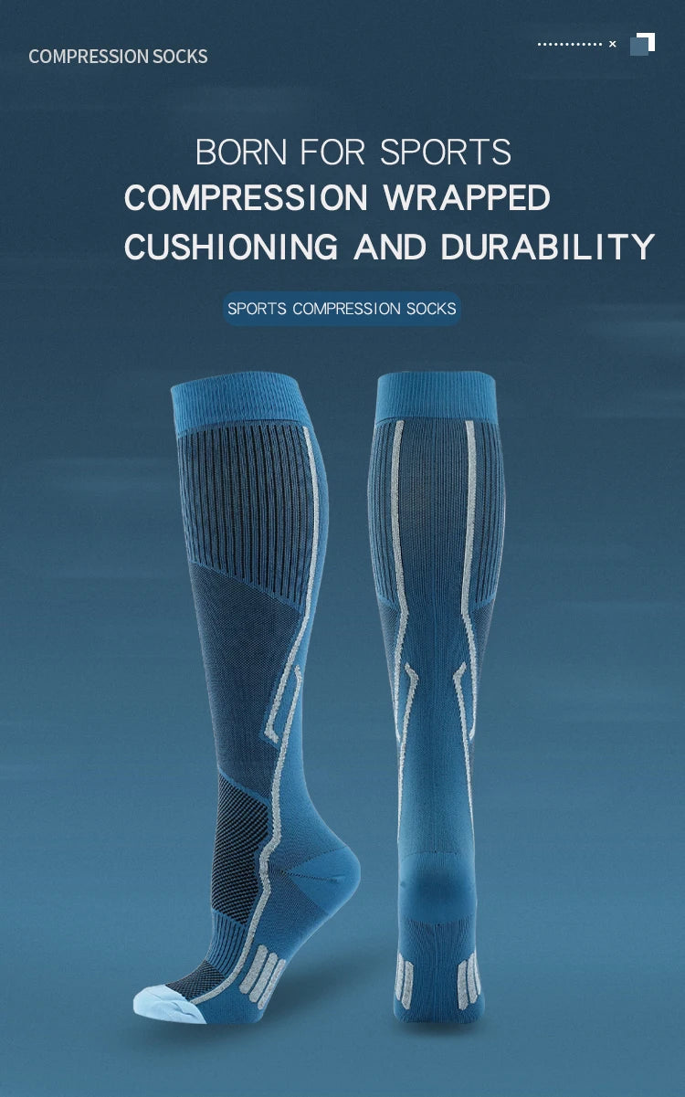 A pair of blue compression socks designed for sports, showing the leg and calf area.