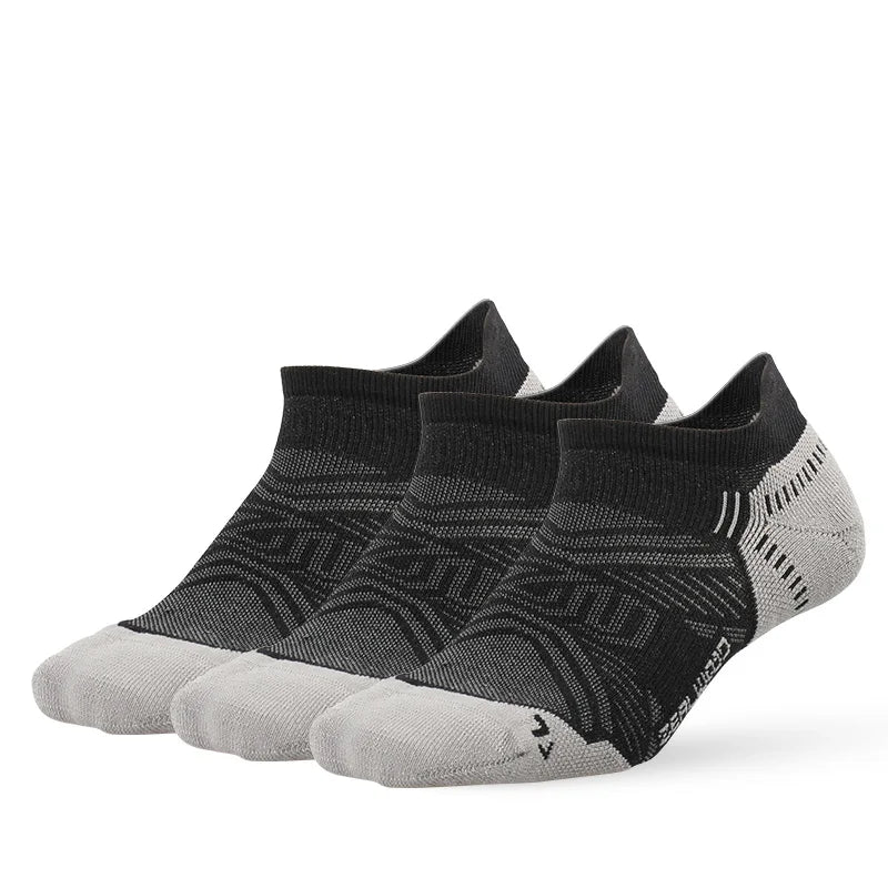 A pair of black and gray breathable performance running socks laid flat.