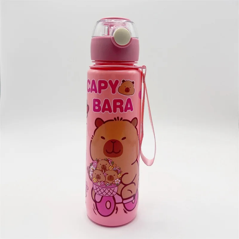 A pink insulated water bottle with a lid and strap featuring bear designs.