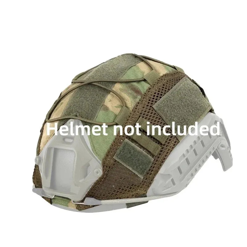 A tactical helmet cover made of camouflage fabric and white plastic is shown from above.