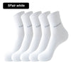 A pack of five white bamboo fiber socks displayed together.