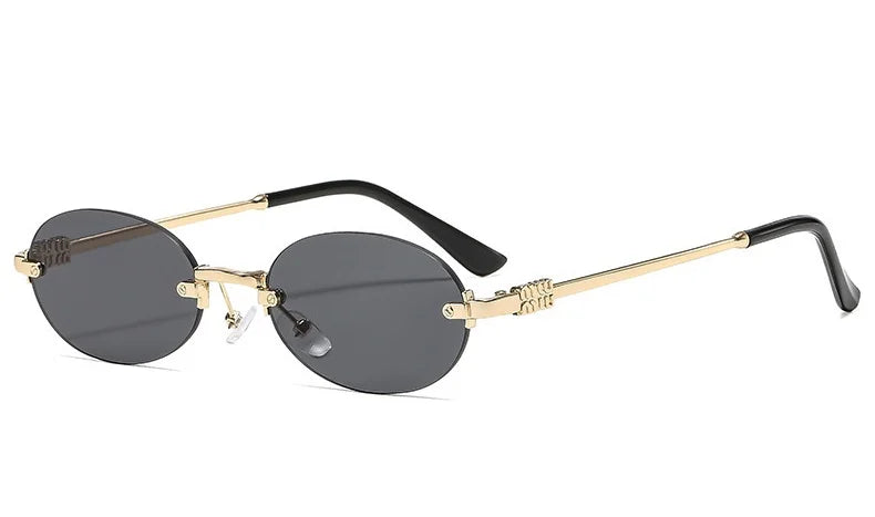 Rimless oval gradient sunglasses with gold and black accents