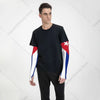 A male model wearing a black t-shirt with red, white, and blue arm sleeves for UV protection.