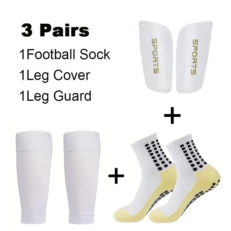 A set of three pairs of men's grip soccer socks, leg covers, and leg guards in white and yellow.
