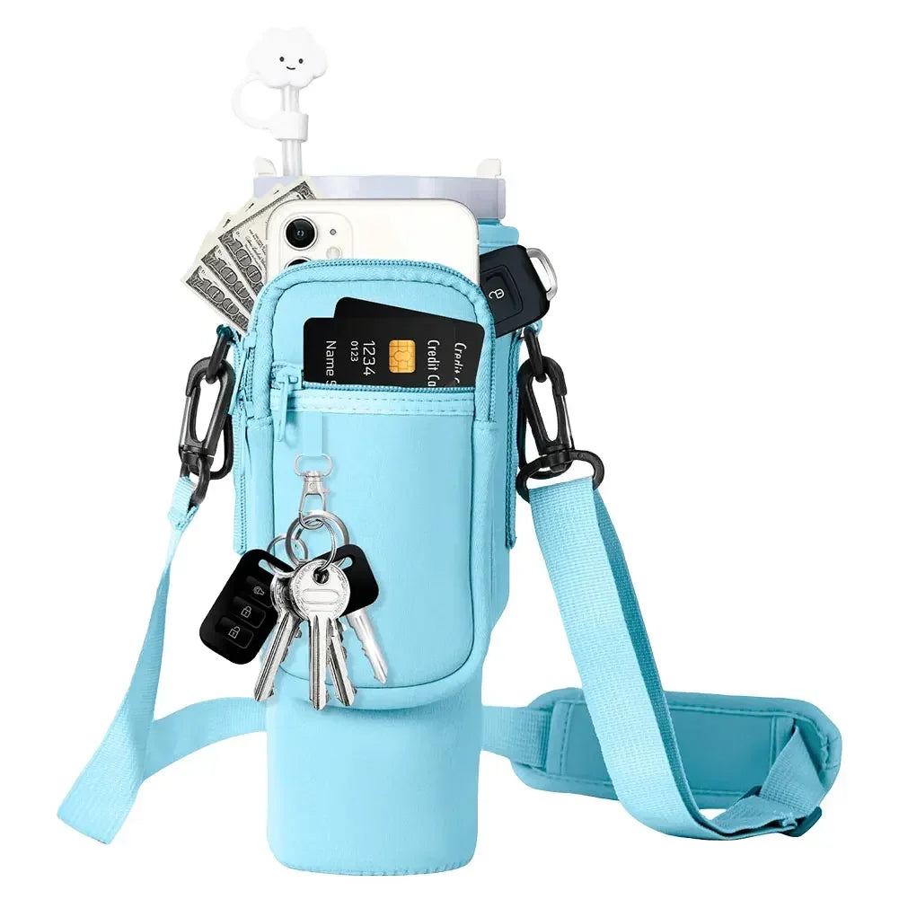 A light blue neoprene water bottle carrier bag with a shoulder strap and various accessories attached.