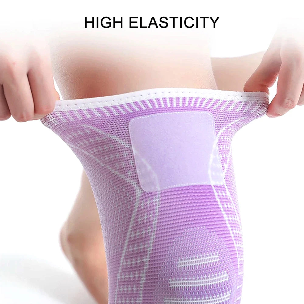 Close-up of a purple knee compression sleeve being held by hands, highlighting its high elasticity.