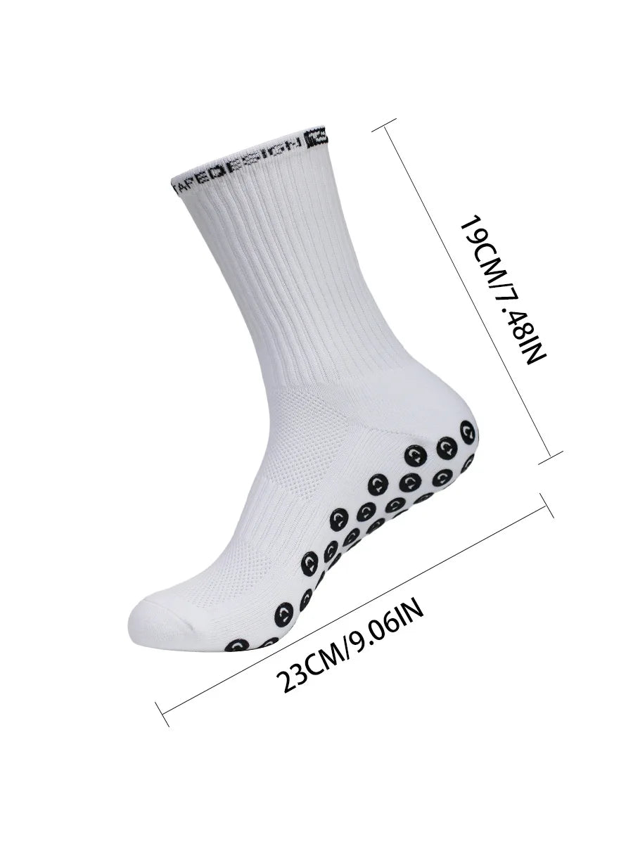 White performance sports gripping socks shown from the side with measurements.