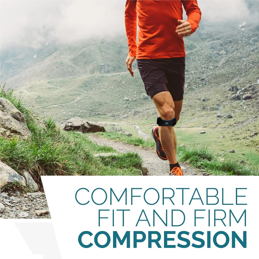 A person wearing an orange shirt and dark shorts is running on a dirt path, demonstrating comfortable fit and firm compressio