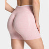 Light pink seamless yoga shorts with a leopard print pattern