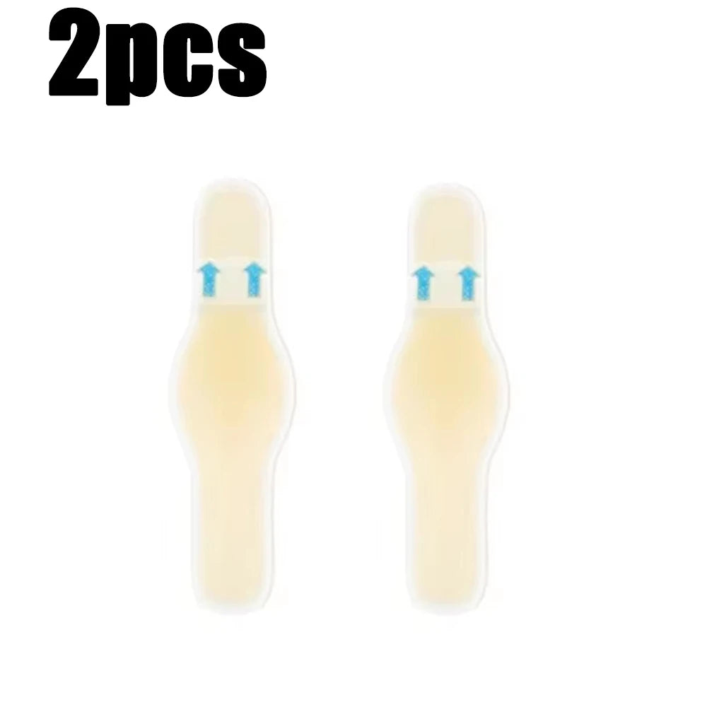Two pairs of clear silicone blister patches with blue markings for foot protection.