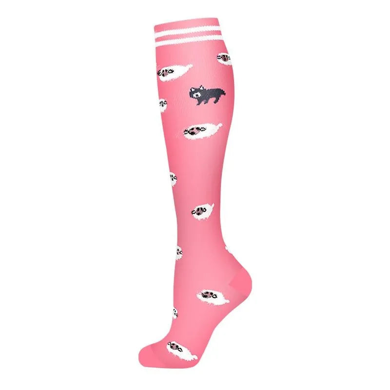 Pink compression socks with black animal patterns