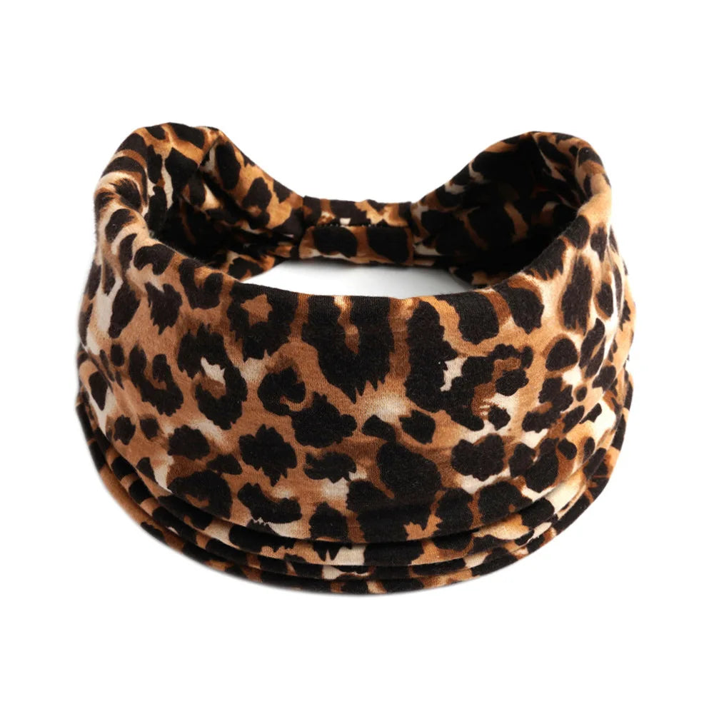 Schwarze und braune Leopardenmuster-Yoga-Stirnband mit breitem Rand aus Baumwolle.