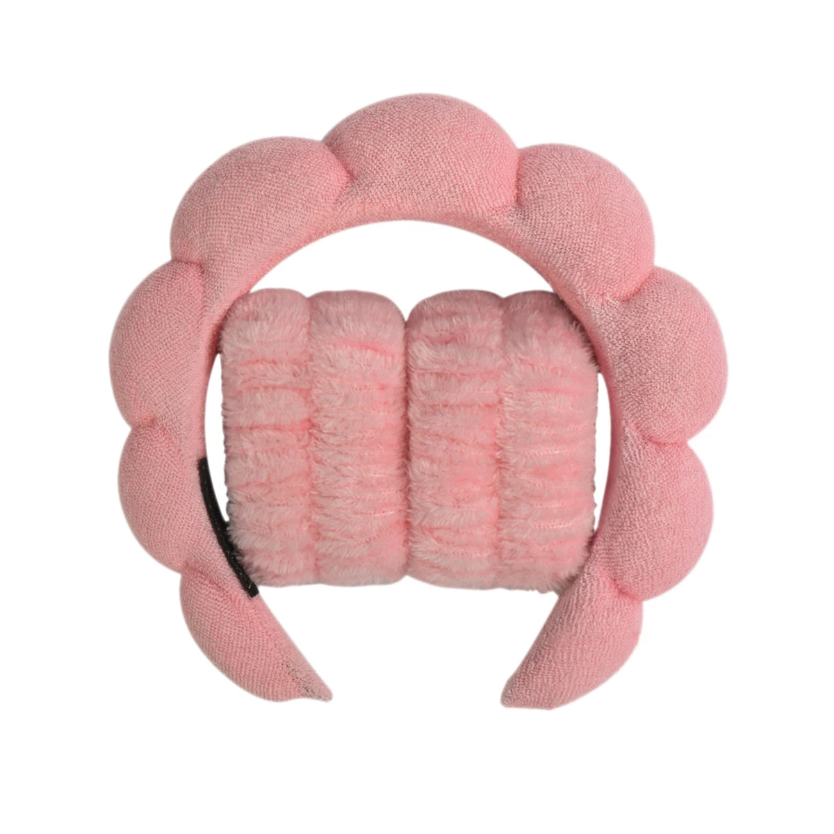 A pink microfiber skincare headband and wristband set with a floral design.
