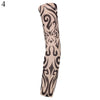 A close-up of a beige arm sleeve featuring black ornamental patterns for UV protection.