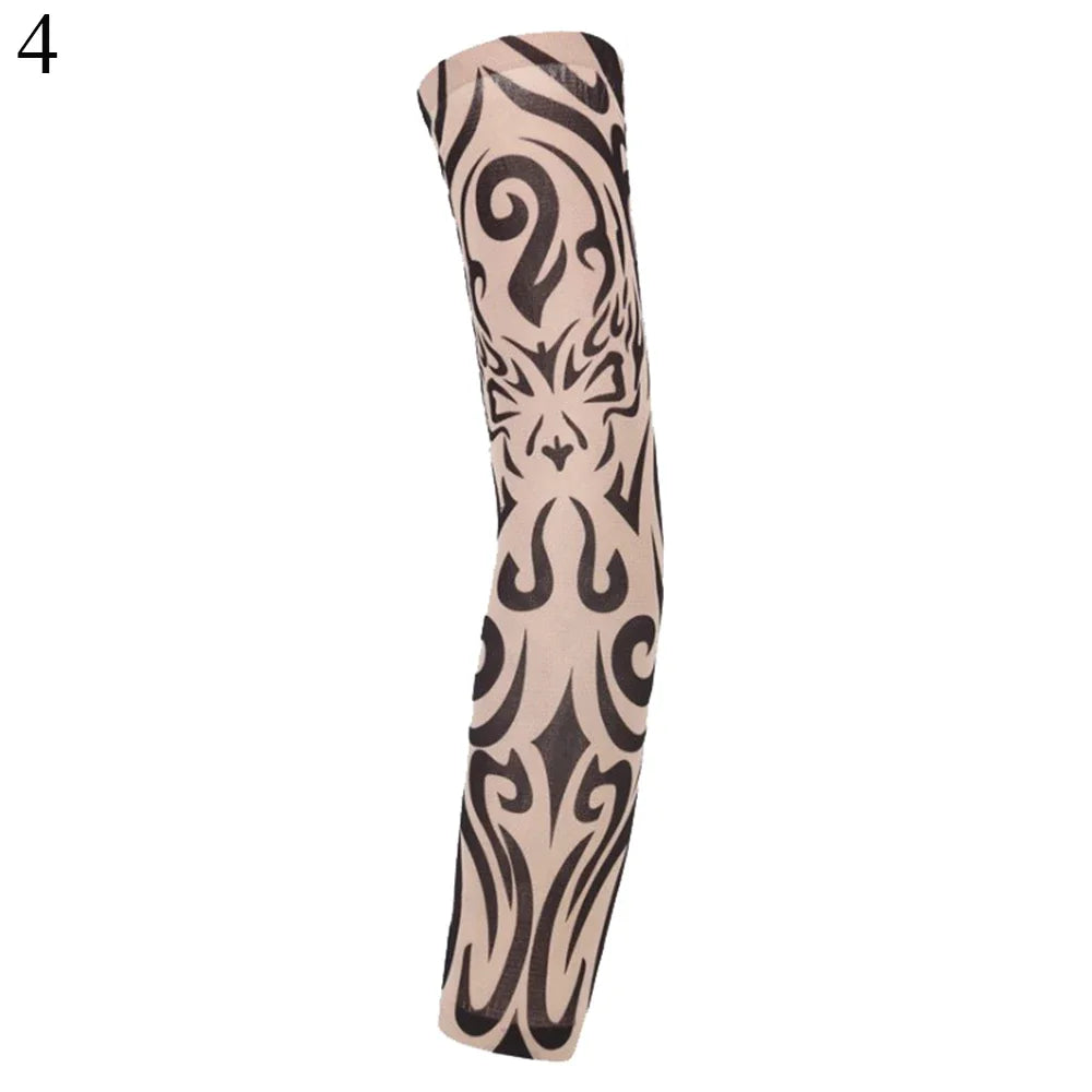 A close-up of a beige arm sleeve featuring black ornamental patterns for UV protection.