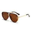 Brown tinted oval pilot sunglasses with gold-toned arms and UV400 protection