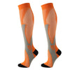 A pair of orange compression socks with gray accents, shown from the side.