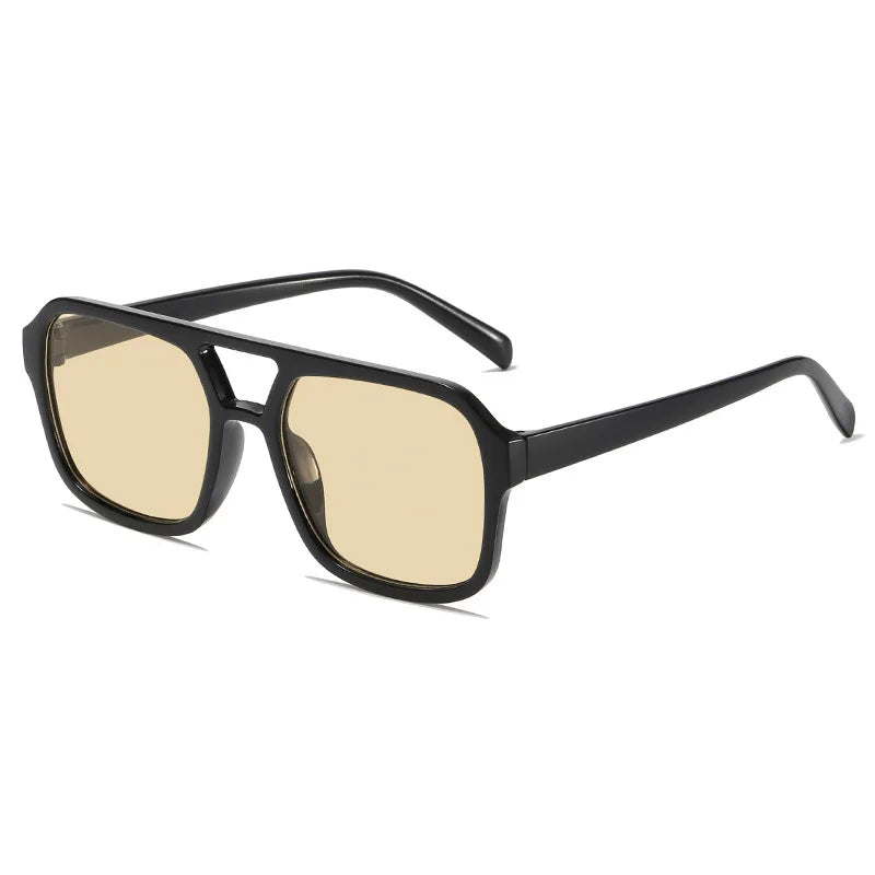 Vintage quadratische Sonnenbrille mit dunklem Rahmen und bernsteinfarbenen Linsen
