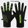 A pair of female green thermal cycling and running gloves shown against a white background.