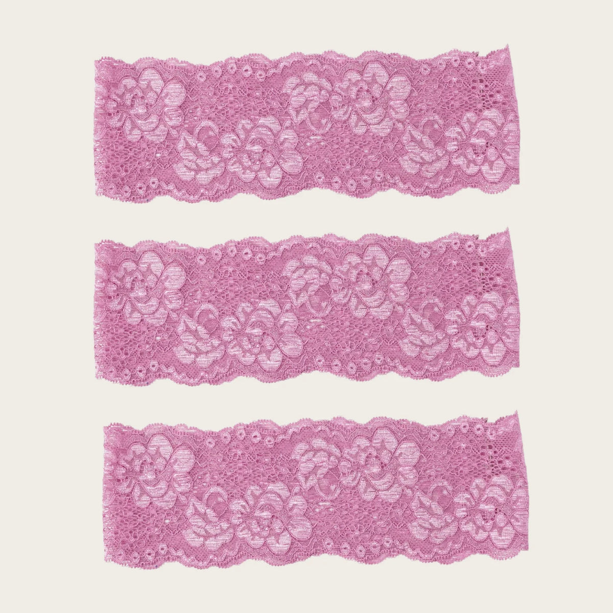 Tres diademas de encaje rosa para fitness y yoga