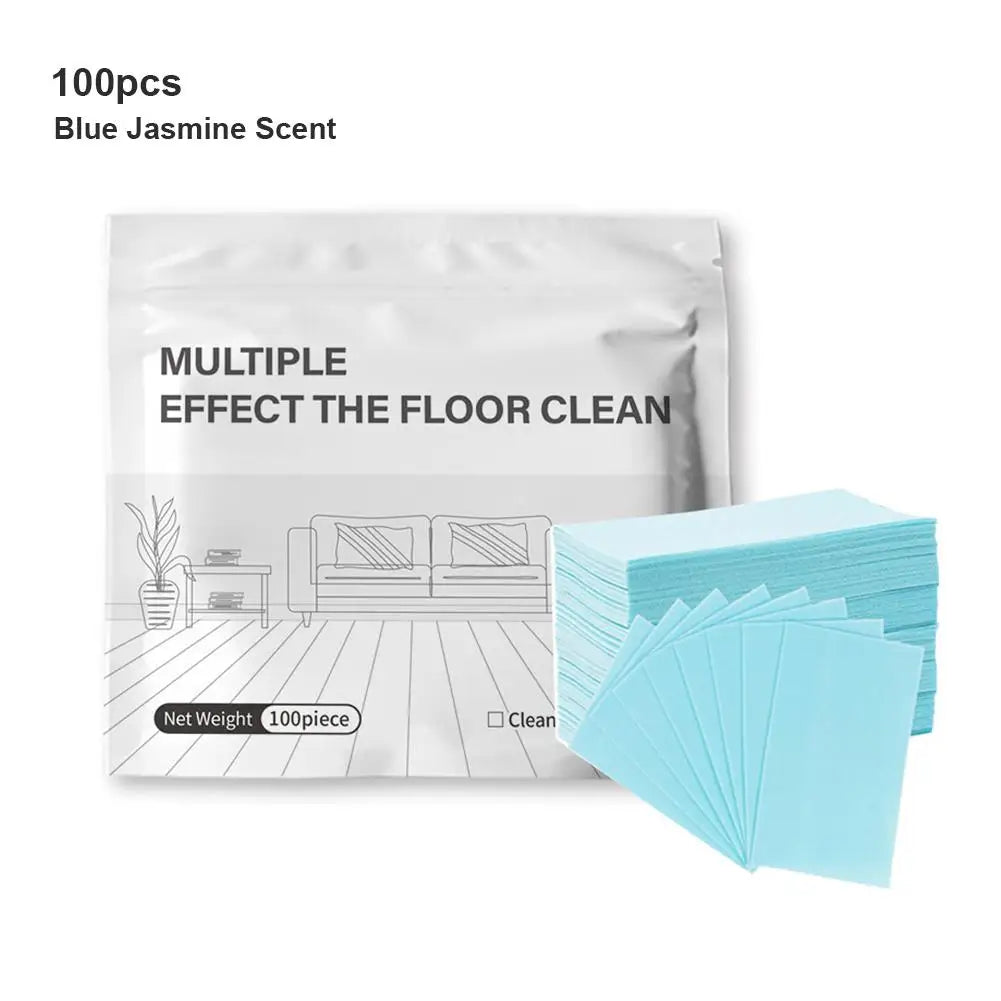 A package of 100 pieces of blue jasmine scent floor cleaning tablets and a stack of light blue cleaning sheets.