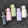 A collection of five colored stainless steel insulated water bottles in shades of pink, green, purple, and cream.