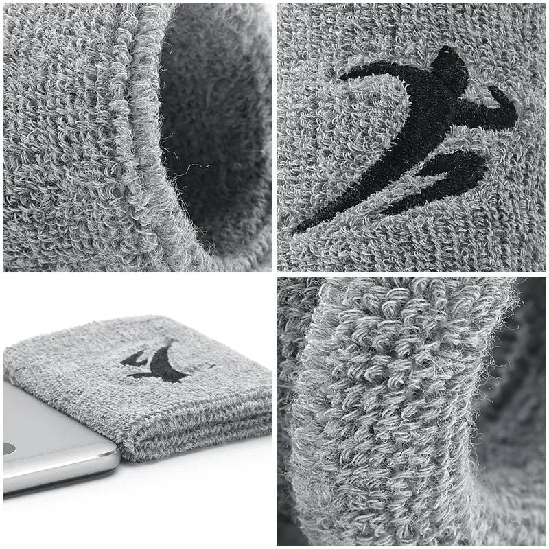 Nahaufnahme grauer Strick-Sportarmbänder, die Textur und eine Silhouetten-Design zeigen.