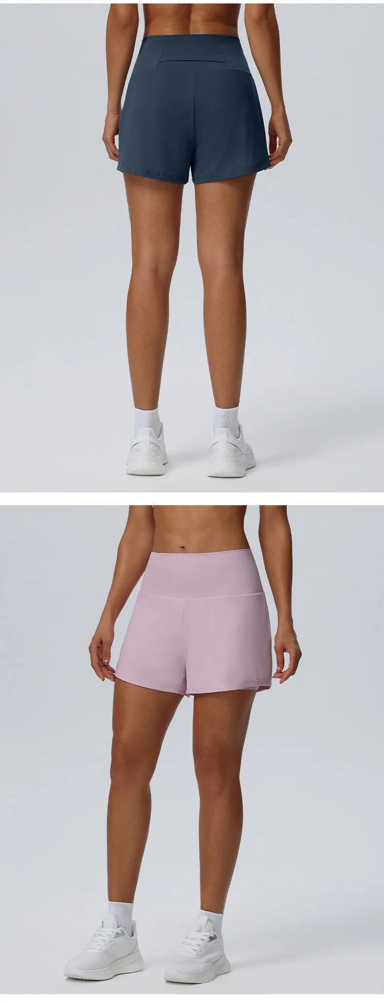 Ein Model trägt dunkelblaue, schnelltrocknende Sportshorts und weiße Socken vor einem hellgrauen Hintergrund.