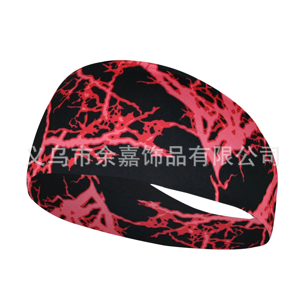 Black elastic sports headband with a vibrant pink, cracked network pattern.