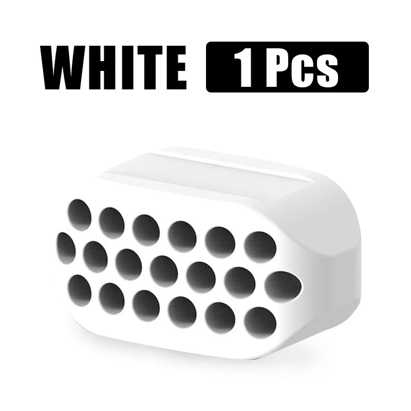 White silicone jawline exerciser and facial toner, packaged as one piece.