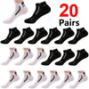 A collection of 20 pairs of black and white mesh ankle socks displayed in various styles.