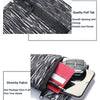 Black striped zippered wrist bag designed to hold a phone and key card.