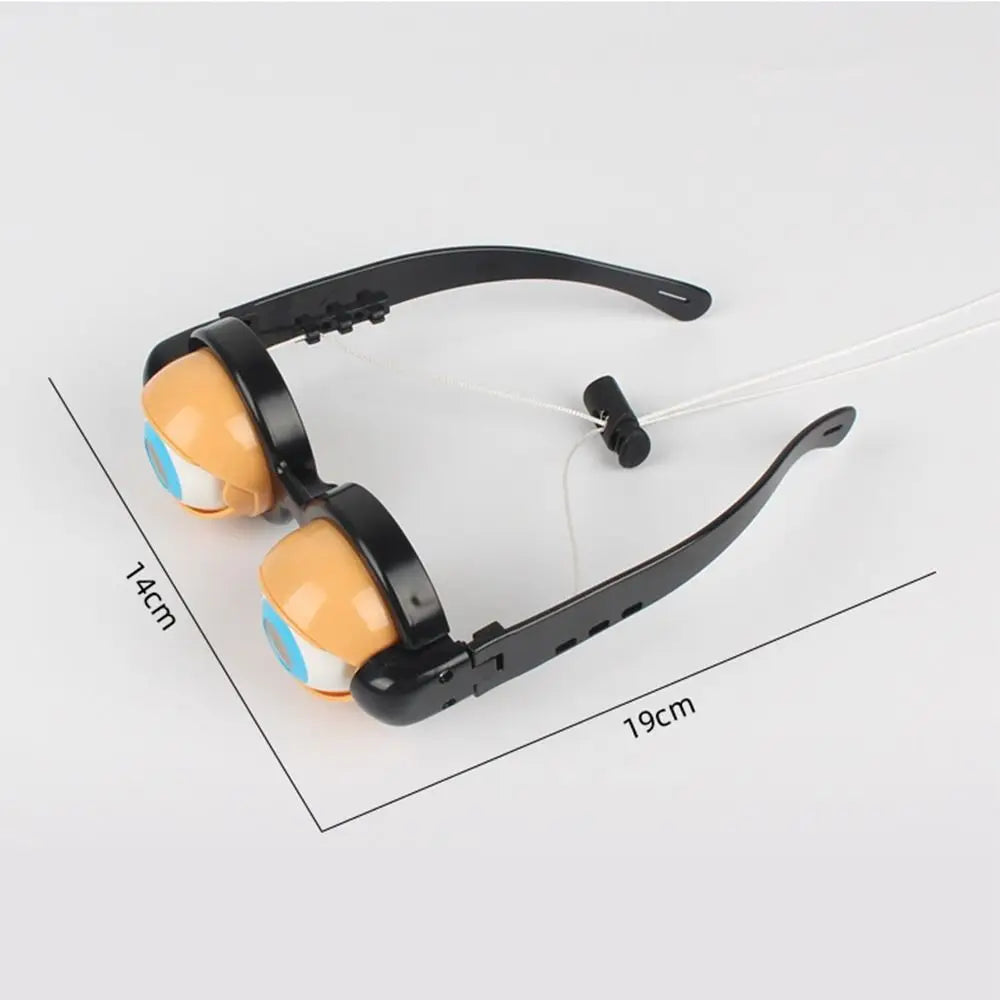 A pair of black novelty glasses with orange lenses and a thin wire, shown from above.
