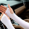 A close-up of a person wearing white summer ice silk sun protection arm sleeves on their hands and arms.