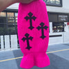 A bright pink tactical knit balaclava beanie hat featuring black cross embroidery.