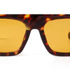 Vintage oversized square sunglasses with a tortoiseshell pattern frame and yellow-tinted lenses.