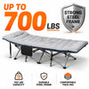 A portable foldable camping cot featuring a strong steel frame and a comfortable thick pad.