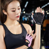A woman wearing black athletic wear is demonstrating anti-slip fingerless gym gloves with wrist support.