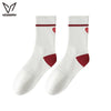 A pair of white crew socks with maroon stripes and heart patterns for athletic activities.